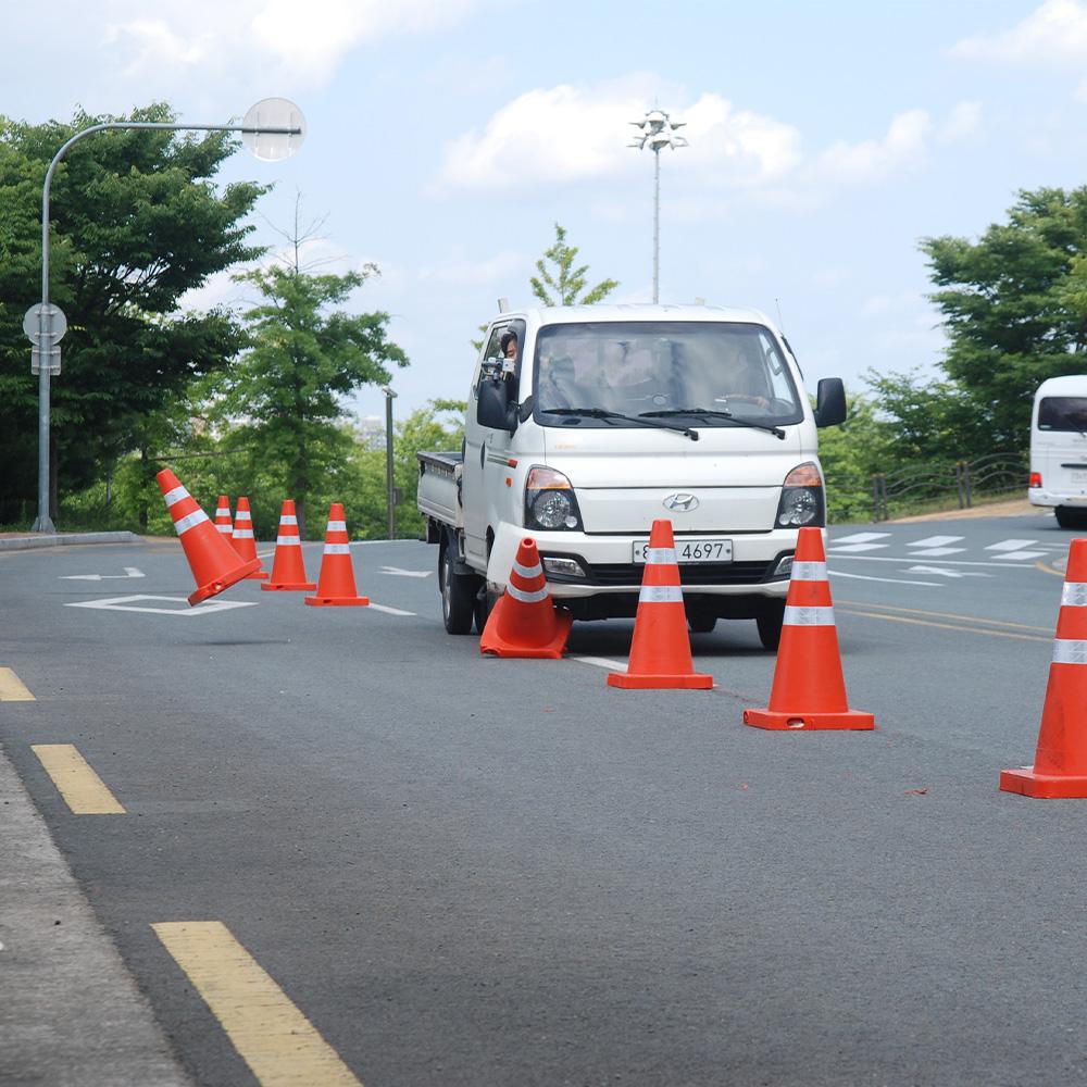 Traffic cone with alarm system